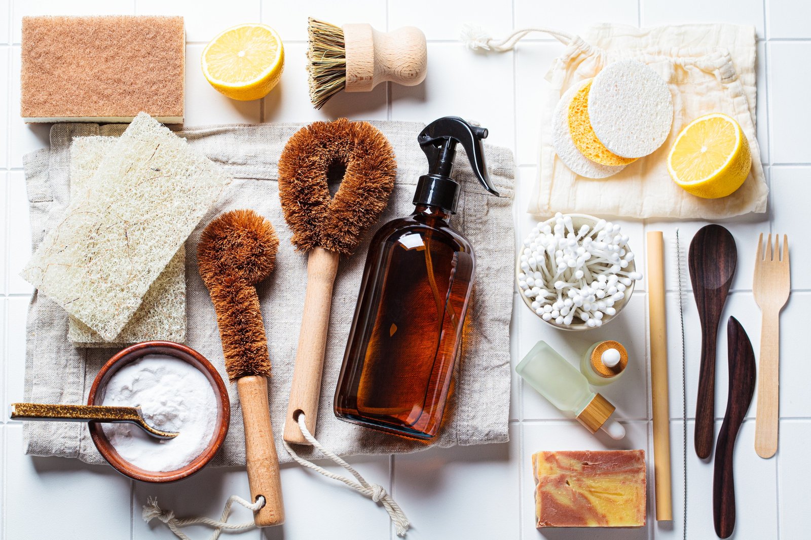 Flat lay eco products and accessories for home cleaning, skin care and lifestyle items.